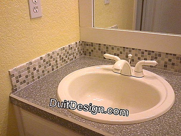 Replacing a mixer tap with a mixer tap on a washbasin